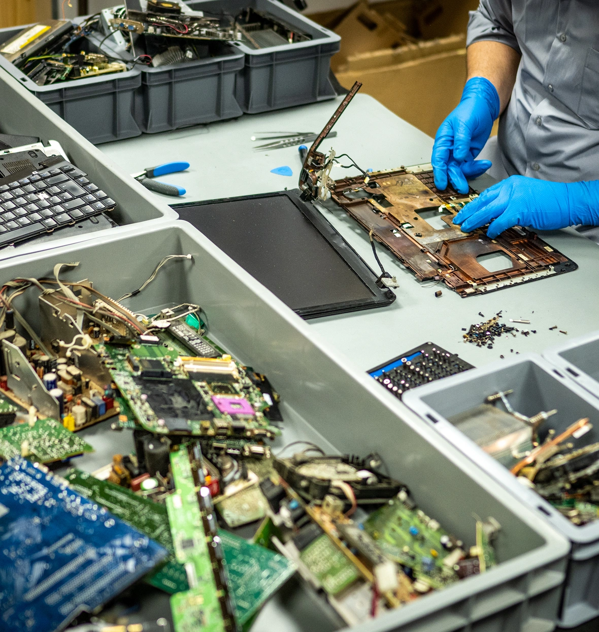 Electronic components being sorted and repaired.